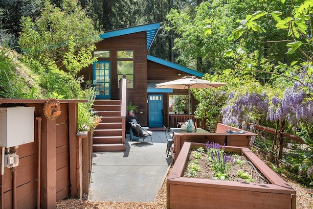 11969 Canyon Dr, Guerneville, CA 95446 - view of patio featuring a vegetable garden