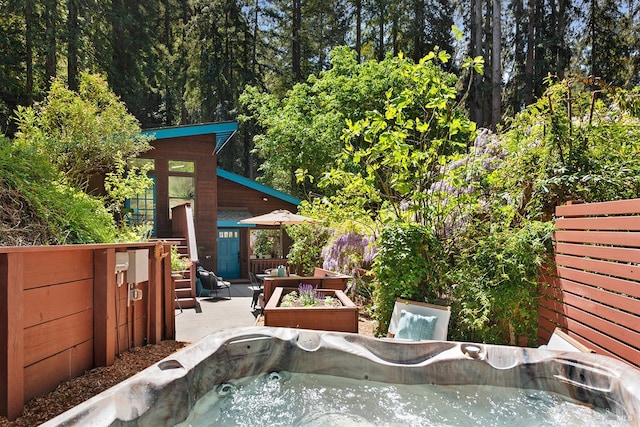 11969 Canyon Dr, Guerneville, CA 95446 - view of patio with fence and a hot tub