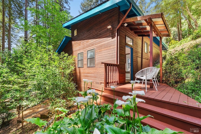 11969 Canyon Dr, Guerneville, CA 95446 - living room featuring a wood stove, a skylight, lofted ceiling, ceiling fan, and recessed lighting