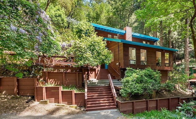 11969 Canyon Dr, Guerneville, CA 95446 - full bath with tile patterned floors, tile walls, a bath, a shower stall, and two vanities
