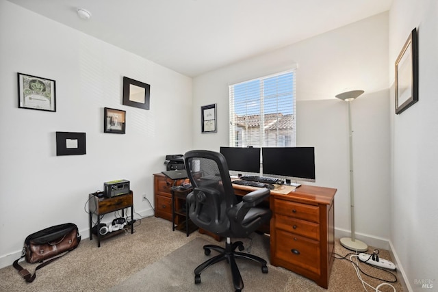 office featuring carpet and baseboards