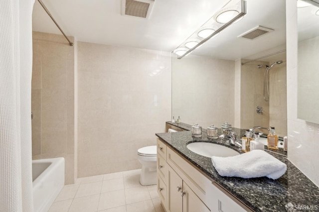 1483 Sutter St Unit 901, San Francisco, CA 94109 - bathroom with shower / tub combo, tile patterned flooring, toilet, vanity, and tile walls