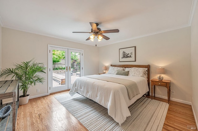 bedroom featuring crown molding, light wood-type flooring, baseboards, and access to exterior