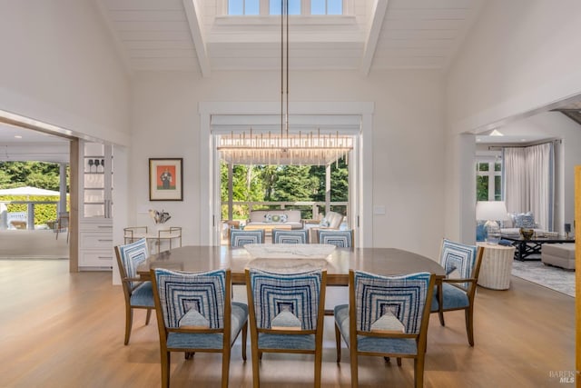 1711 Spring St, Saint Helena, CA 94574 - dining space with beamed ceiling, a wealth of natural light, and light wood-type flooring