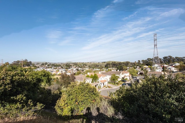 birds eye view of property with a residential view
