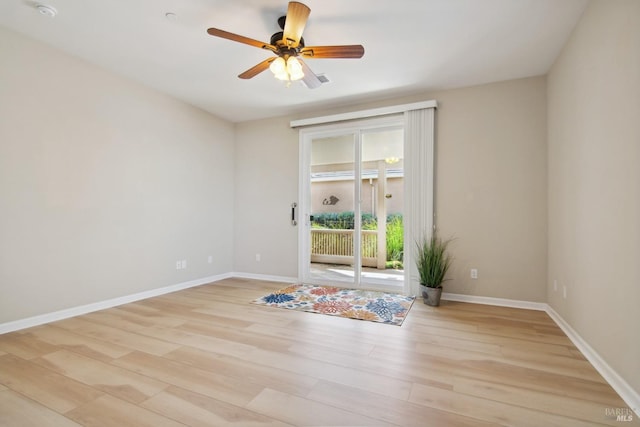 unfurnished room with light wood finished floors, ceiling fan, and baseboards