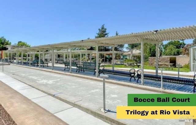 view of property's community with a pergola
