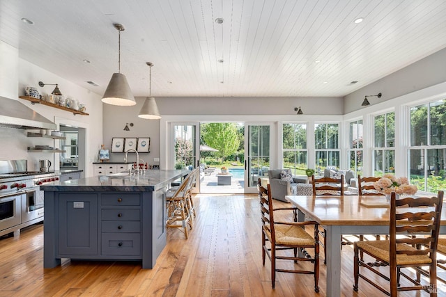 5310 Silverado Trl, Napa, CA 94558 - kitchen with light wood-type flooring, a sink, a healthy amount of sunlight, and double oven range