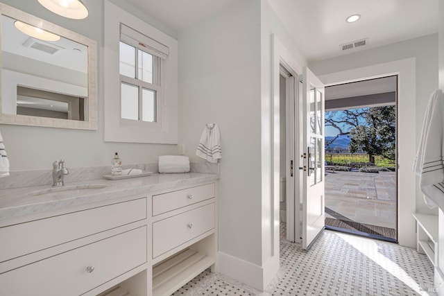 5310 Silverado Trl, Napa, CA 94558 - bathroom with vanity, baseboards, tile patterned floors, and visible vents