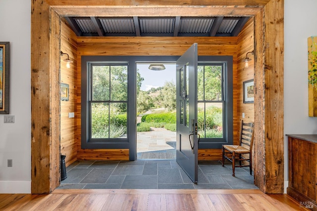 5310 Silverado Trl, Napa, CA 94558 - doorway to outside with wooden walls, beamed ceiling, wooden ceiling, and wood finished floors