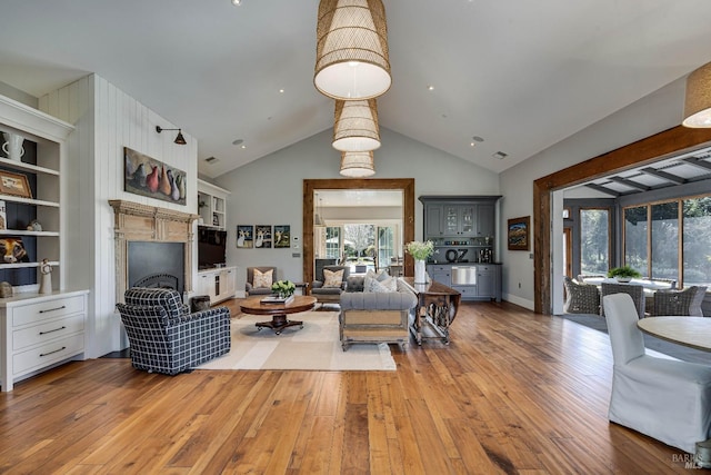 5310 Silverado Trl, Napa, CA 94558 - living room featuring wood-type flooring, high vaulted ceiling, and visible vents