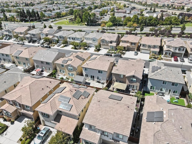 birds eye view of property with a residential view