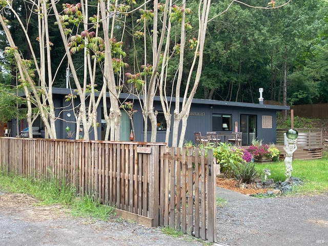 view of front of house featuring fence private yard