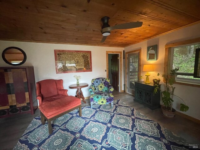 dining area with baseboards, light wood-style flooring, and wooden ceiling