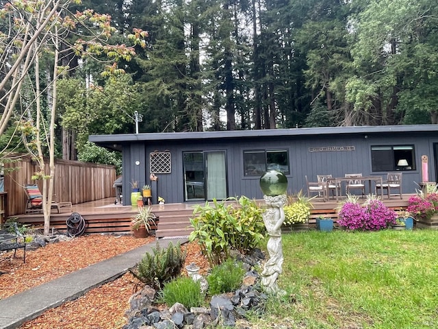 view of front of house featuring a deck