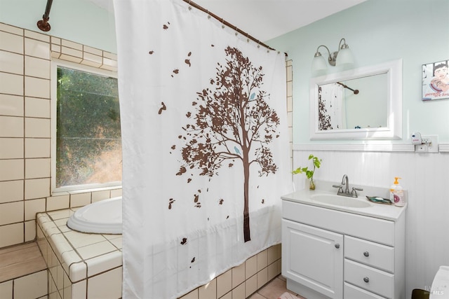 bathroom with vanity, a bathtub, and a shower with curtain