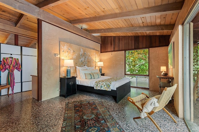 bedroom with beamed ceiling and wood ceiling