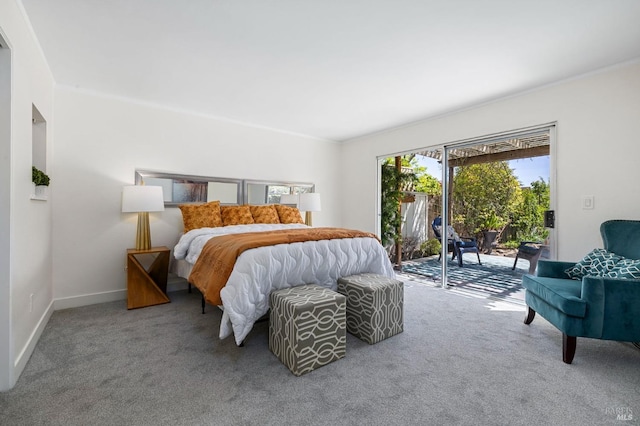 bedroom with baseboards, carpet flooring, ornamental molding, and access to exterior