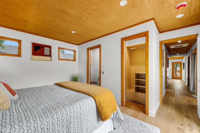 bedroom featuring visible vents, crown molding, baseboards, light wood finished floors, and recessed lighting