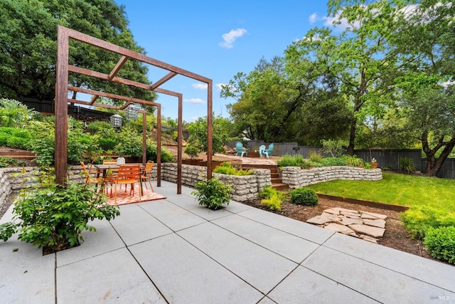 view of patio / terrace featuring outdoor dining area, a fenced backyard, and a pergola