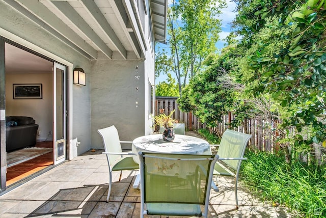view of patio / terrace with fence and outdoor dining space