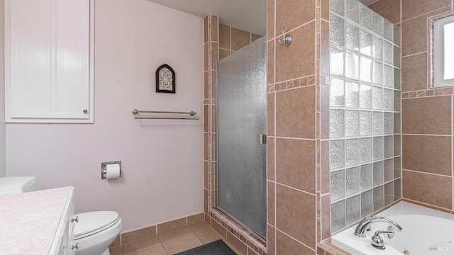 full bathroom featuring a shower stall, vanity, a bath, tile patterned floors, and toilet