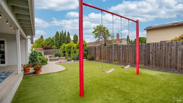 view of yard with a fenced backyard and a patio area