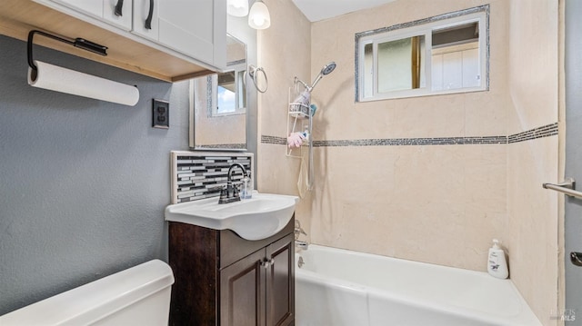 full bath featuring toilet, shower / washtub combination, and vanity