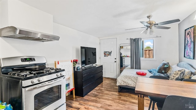 bedroom with wood finished floors and a ceiling fan