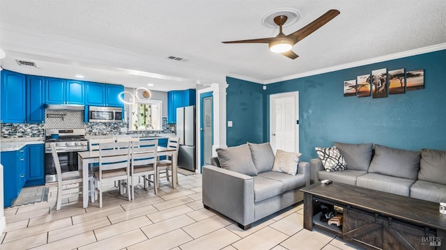 living area with visible vents, ornamental molding, and ceiling fan