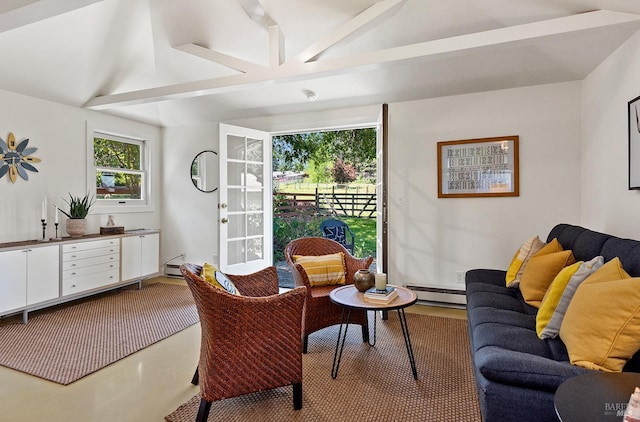 living area with vaulted ceiling with beams, concrete flooring, a baseboard heating unit, and baseboard heating