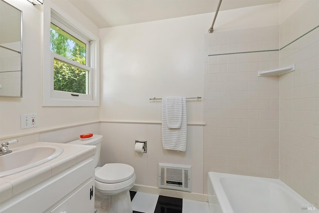 bathroom with wainscoting, vanity, shower / bathtub combination, toilet, and visible vents