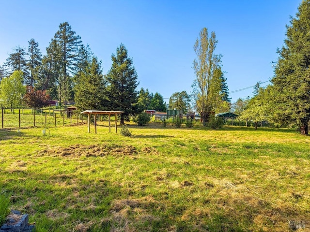 view of yard with fence