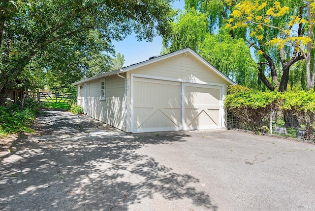 detached garage with fence