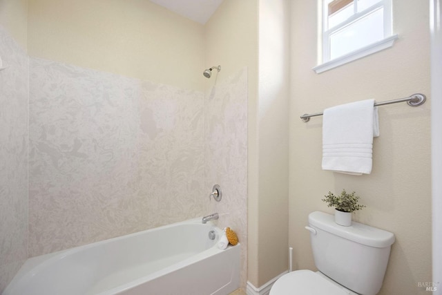 full bathroom featuring bathing tub / shower combination and toilet