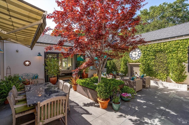 view of patio / terrace featuring outdoor lounge area and outdoor dining space
