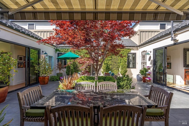 view of patio with outdoor dining area