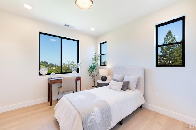 1975 W Bristlecone Ct, Santa Rosa, CA 95403 - bedroom with light wood-type flooring, baseboards, and recessed lighting