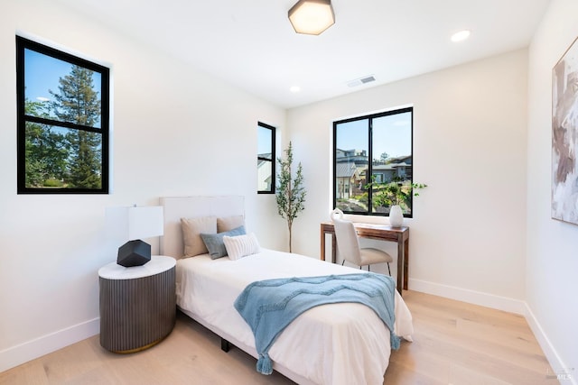 1975 W Bristlecone Ct, Santa Rosa, CA 95403 - bedroom featuring wood finished floors, baseboards, and recessed lighting