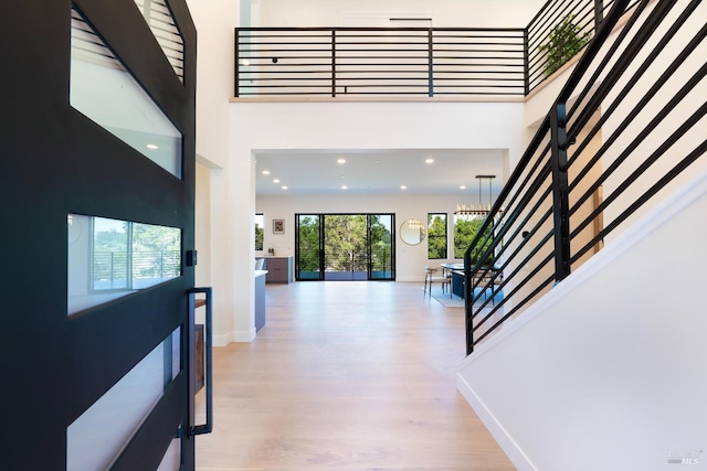 1975 W Bristlecone Ct, Santa Rosa, CA 95403 - foyer featuring a towering ceiling, stairway, wood finished floors, baseboards, and recessed lighting