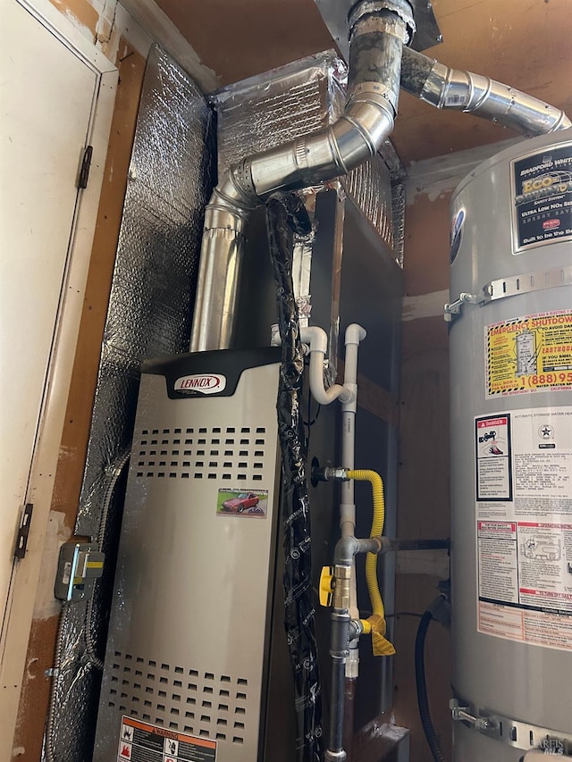 utility room featuring secured water heater and heating unit