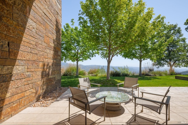view of patio with a mountain view