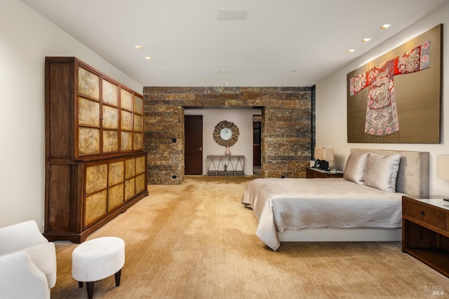 carpeted bedroom with recessed lighting