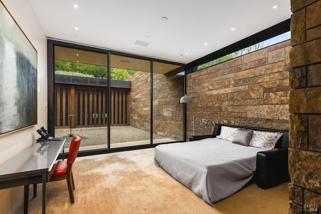 bedroom featuring expansive windows
