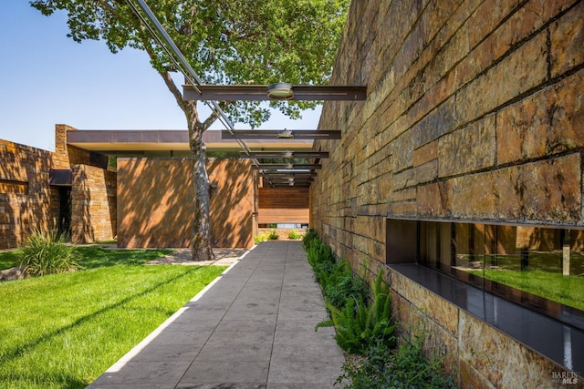 view of property exterior featuring a yard