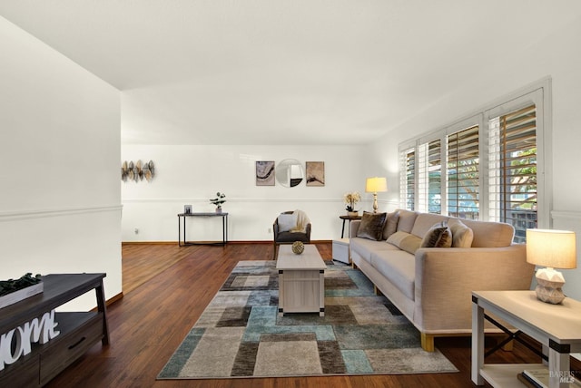 living area with dark wood-style flooring