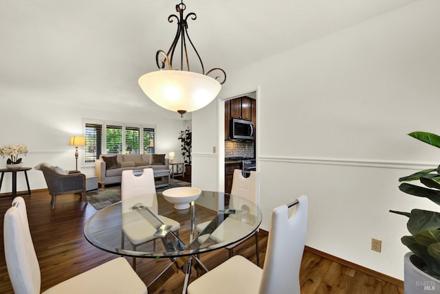 3237 Arroyo Dr, Fairfield, CA 94533 - dining area with wood finished floors and baseboards
