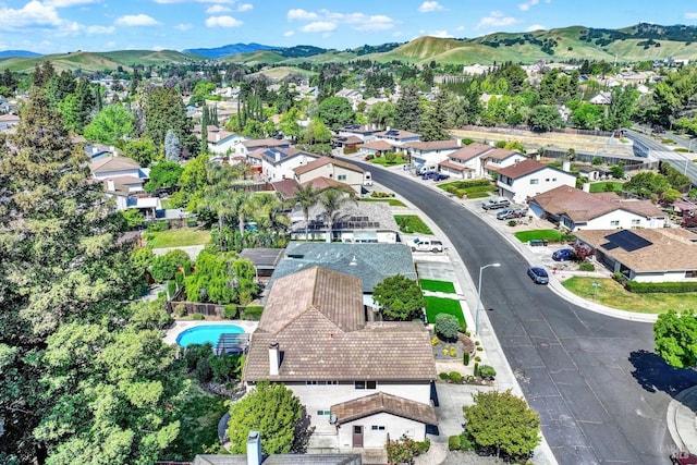 aerial view with a mountain view and a residential view