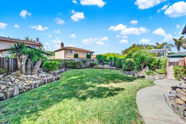 view of yard featuring fence
