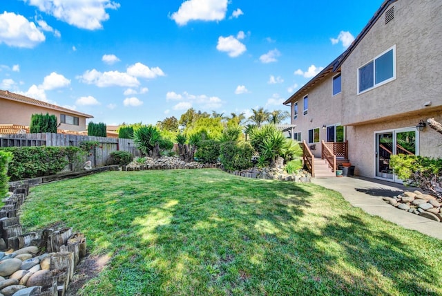 view of yard with fence